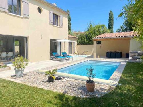 Piscine et villa tout confort au cœur des Alpilles gîte à louer Mas-Blanc-des-Alpilles