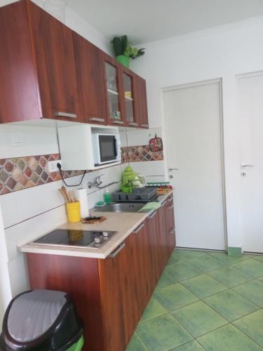 ห้องครัว, Grevia Apartmanok in โปรอสซโล่