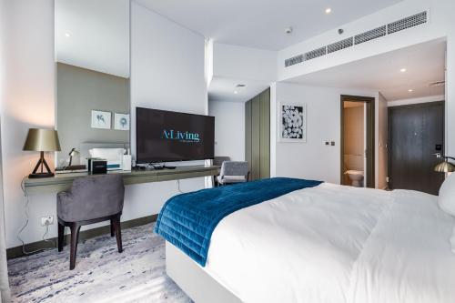 A Living Stylish Studio Apartment With Partial Burj & Canal View at Prive B 1417, Dubaj (zdjęcie 2)
