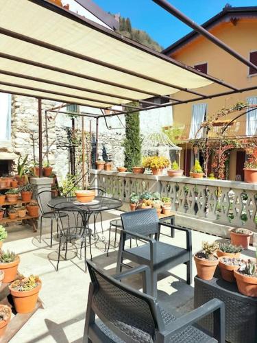 Villa Costanza Appartamento con balcone e vista giardino in มาเกรกลีโอ