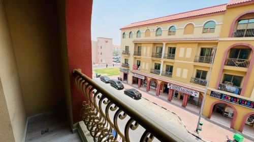 Exterior view, Spacious Furnished studio with balcony Spain cluster International city near Dubai International City