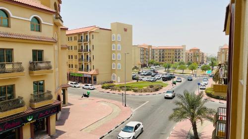 View, Spacious Furnished studio with balcony Spain cluster International city near Dubai International City