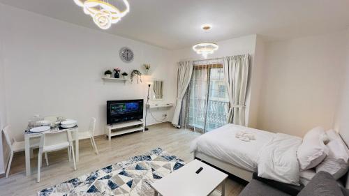Spacious Furnished studio with balcony Spain cluster International city, Dubai
