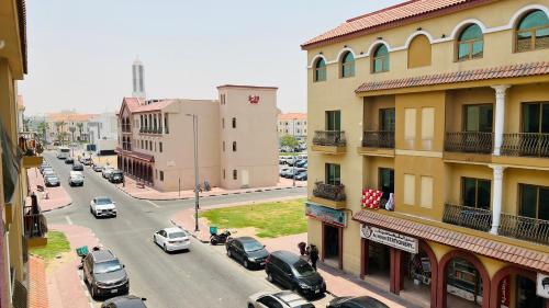 Exterior view, Spacious Furnished studio with balcony Spain cluster International city near Dubai International City