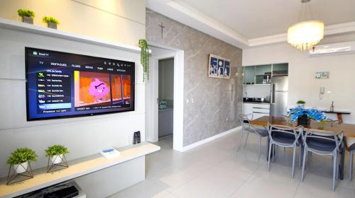 Apartment room in 1077 Excelente opção com duas suítes no centro de Bombinhas