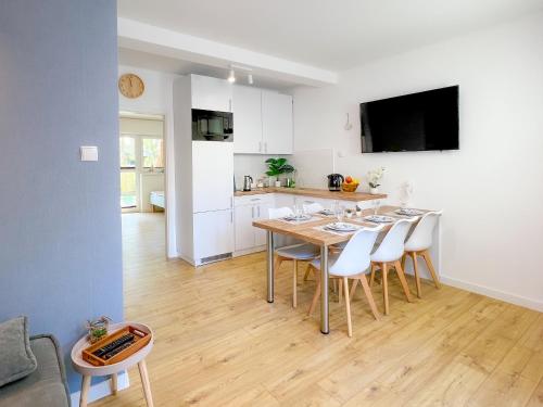 APARTAMENT 6B BLUE MARINE Poddąbie Basen odkryty brodziki plac zabaw