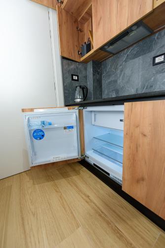 ห้องครัว, Kevin's ApartHotel in วลอรา