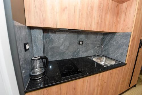 บริการและสิ่งอำนวยความสะดวก, Kevin's ApartHotel in วลอรา