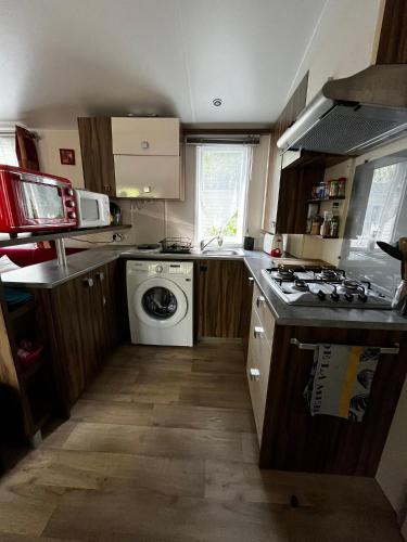virtuve, Superbe Mobilehome 3 ch, climatisé tout confort (Superbe Mobilehome 3 ch, climatise tout confort) in Onesse-Laharie