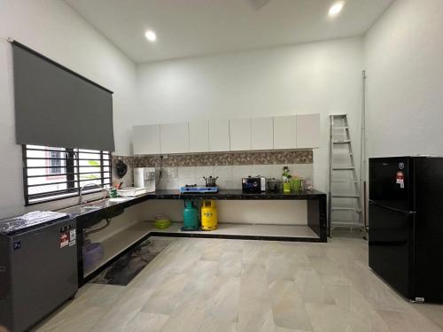 Homestay Kemaman Fyna08 Semi-D, 4 Bedrooms Dekat Pantai Kijal in Golf Course