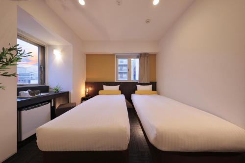 Twin Room - Non-Smoking - 18 sqm