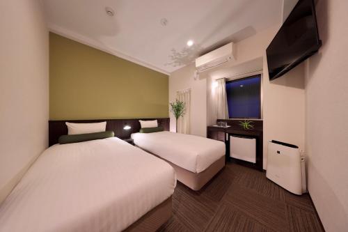 Twin Room - Non-Smoking - 15 sqm