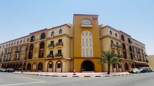 Exterior view, Spacious Furnished studio with balcony Spain cluster International city near Dubai International City
