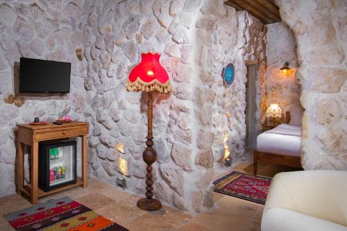 Cappadocia Cavusin Stone House - Tap to explore photos