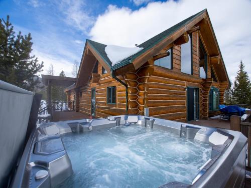 Miles Behind Log Cabin - main image