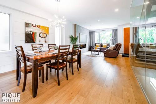 NEW Modern Home - Sleeps 8 - Foosball - Deck & BBQ - Tap to explore photos