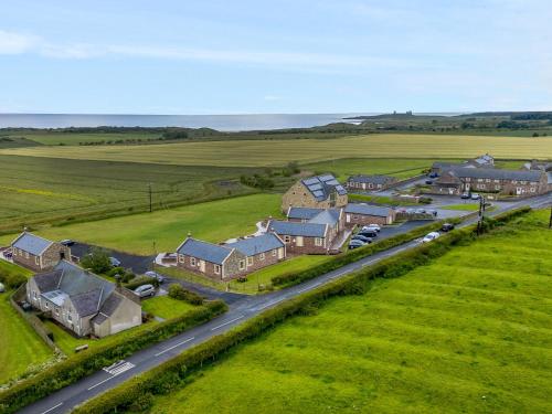 Exterior view, Smithy Cottage in Embleton