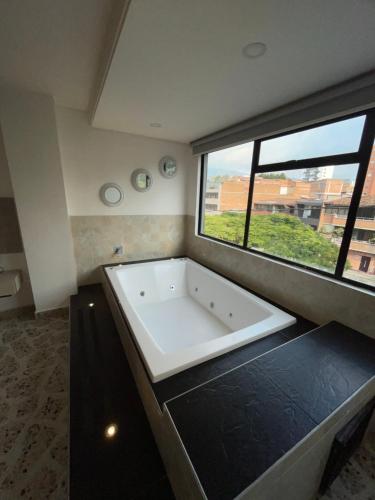 อ่างแช่น้ำร้อน, Hotel Ofix in เลาเรเลส