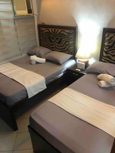 COMFY 1-BR Condo near SLEC, US Embassy, Malls,Park, Manila