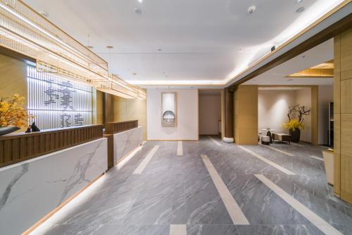 Jianguo Puyin Hotel - Xi'an Big Wild Goose Pagoda University of Science and Technology Qujiang Campu in شرق المدينة