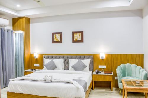 King Room with Balcony room in ZiP By Spree Hotels Grand Legacy Prime - GMS Road Dehradun