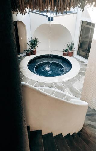 Swimming pool, Caracola Boutique Hostel in El Paredon Buena Vista