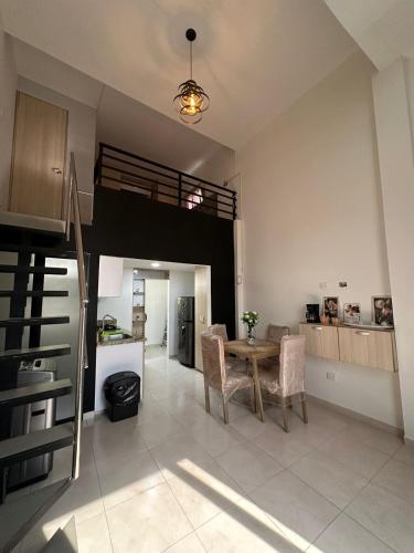 ห้องครัว, Apartaestudio Amoblado Tipo Loft en Barrio la Campiña (Apartaestudio Amoblado Tipo Loft en Barrio la Campina) in อูร์บานิซาซิออนเลาเรเลส