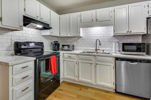 High Point Townhome with Patio, 1 Mi to Main Street! in High Point, USA