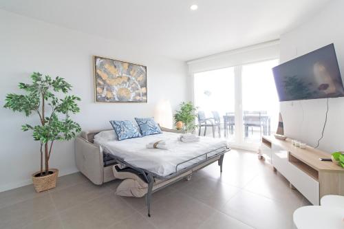 Közös társalgó / TV, Global Vacacional, Apartamento con amplia terraza con vistas al mar in Canet d'En Berenguer