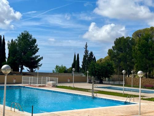 Úszómedence, Casa con vistas al mar y Patio de Buganvillas in Aigues