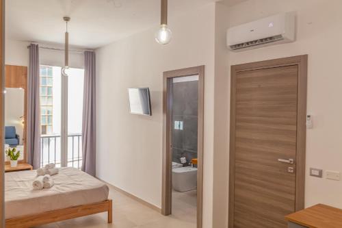 Quadruple Room with Private Bathroom image 1