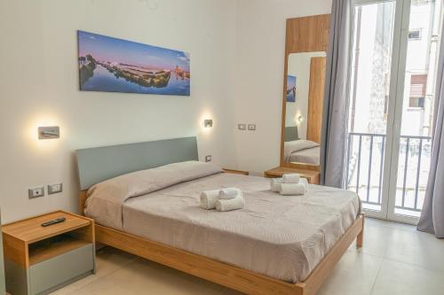 Quadruple Room with Private Bathroom room in Isgrò Rooms