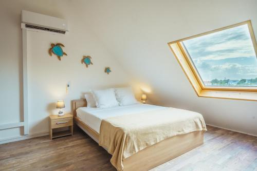 Charmant duplex avec vue mer et piscine - Le Goyave in Mare Gaillard