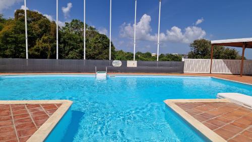 Piscine, Charmant duplex avec vue mer et piscine - Le Goyave in Mare Gaillard