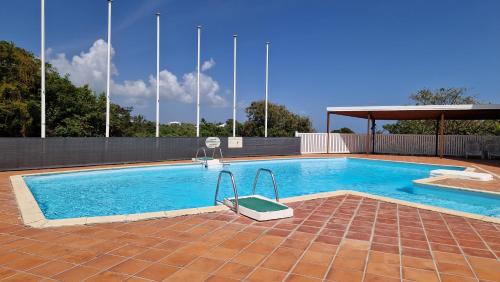Piscine, Charmant duplex avec vue mer et piscine - Le Goyave in Mare Gaillard