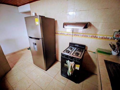 Kitchen, Casa Pupo Hostal in Torices