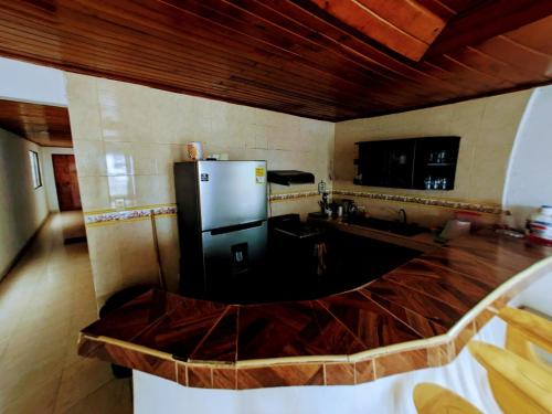 Kitchen, Casa Pupo Hostal in Torices