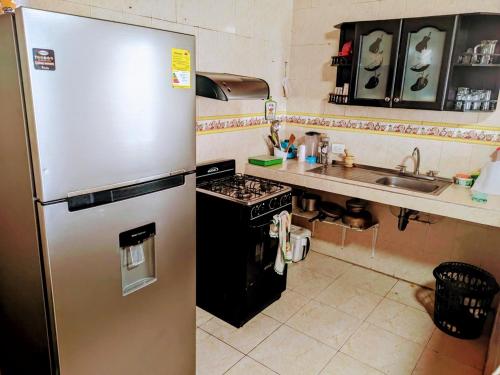 Kitchen, Casa Pupo Hostal in Torices