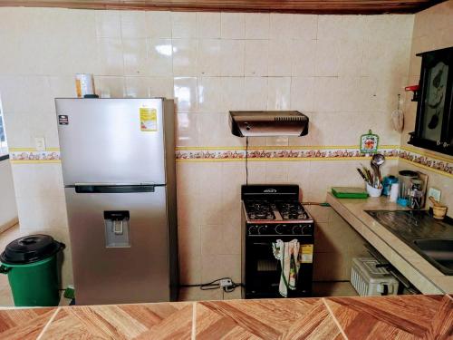 Kitchen, Casa Pupo Hostal in Torices
