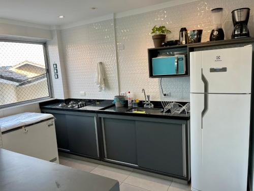 Apartamento pe na areia praia Tombo in Praia do Tombo