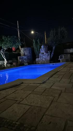 Villa con piscina "Pumo"