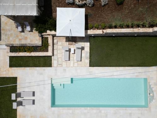Trullamia, Trullo storico con piscina