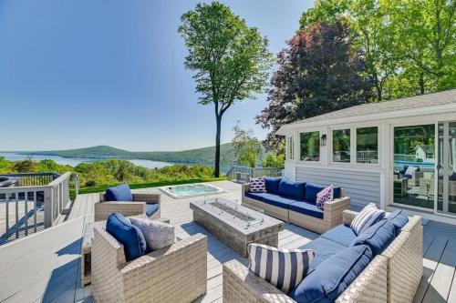 Hot Tub While Taking In Lake Front View in Neiplsa (NY)