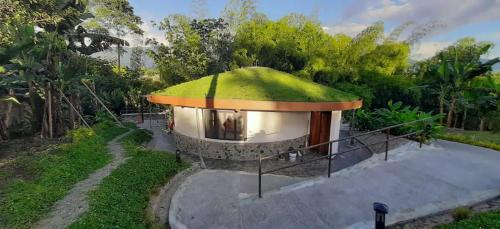 Small Round House with Living Roof, Armenia