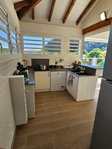 кухня, Villa Célyote - Haut de villa, vue mer, à 150m de la plage Anse Figuier (Villa Celyote - Haut de villa, vue mer, a 150m de la plage Anse Figuier) in Terre-de-Haut
