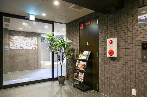 ห้องส่วนกลางสำหรับนั่งเล่น/ดูทีวี, ไอนา เฮาส์ กิออน (INA HOUSE GION) in เกียวโต