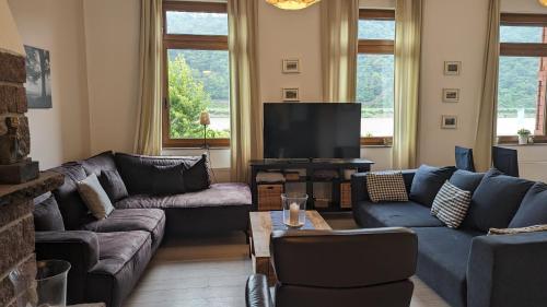 Koplietošanas atpūtas telpa ar TV, Rheinsteig-Ferienwohnungen 5 Apartments in Kaub