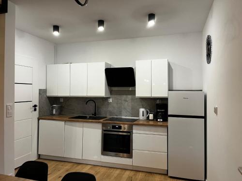 Szyszki i Motyle in ซาร์บสค์