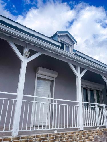 Pintu masuk, Ka Villa Location in Pointe-Noire