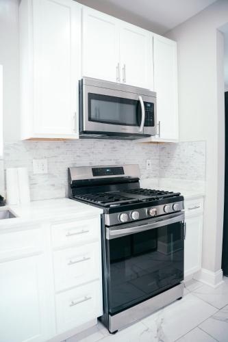 Charm City Luxury 4 Bedroom Brick Home in Park Heights